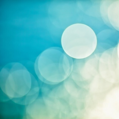 bright colorful sun and sea bokeh